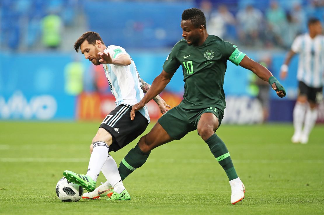 SAINT PETERSBURG, RUSSIA - JUNE 26: Lionel Messi of Argentina vies with Mikel John Obi of Nigeria during the 2018 FIFA World Cup Russia group D match between Nigeria and Argentina at Saint Petersburg Stadium on June 26, 2018 in Saint Petersburg, Russia. (Photo by Ian MacNicol/Getty Images)