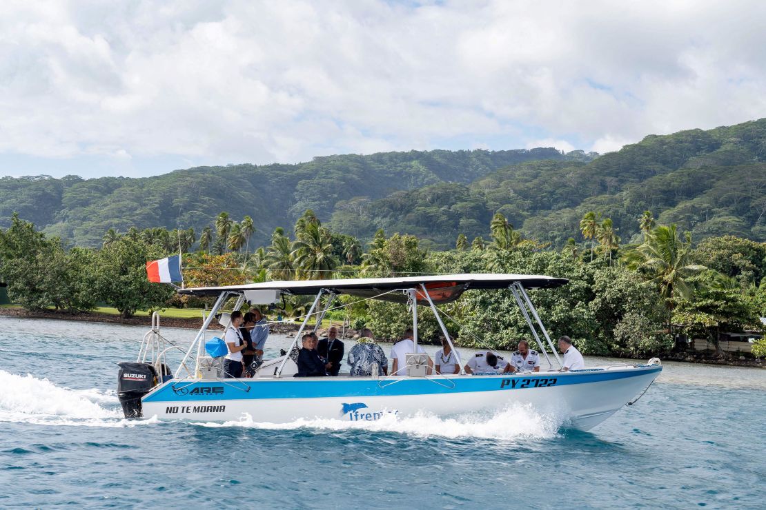 France's Interior Minister Gerald Darmanin (C) sails on the 2024 Olympic Games surfing venue in Teahupoo, on August 16, 2023, as part of his four-day official visit on the island of Tahiti. (Photo by Suliane FAVENNEC / AFP) (Photo by SULIANE FAVENNEC/AFP via Getty Images)