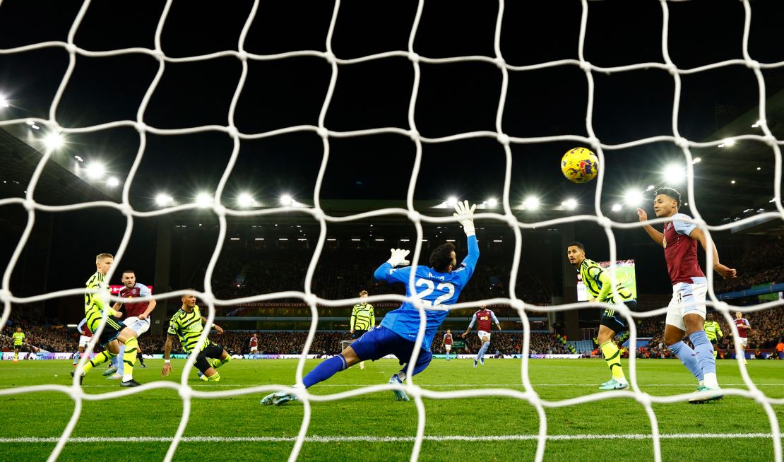 Soccer Football - Premier League - Aston Villa v Arsenal - Villa Park, Birmingham, Britain - December 9, 2023
Aston Villa's John McGinn scores their first goal past Arsenal's David Raya Action Images via Reuters/John Sibley NO USE WITH UNAUTHORIZED AUDIO, VIDEO, DATA, FIXTURE LISTS, CLUB/LEAGUE LOGOS OR 'LIVE' SERVICES. ONLINE IN-MATCH USE LIMITED TO 45 IMAGES, NO VIDEO EMULATION. NO USE IN BETTING, GAMES OR SINGLE CLUB/LEAGUE/PLAYER PUBLICATIONS.