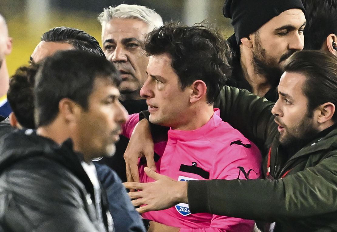 ANKARA, TURKIYE - DECEMBER 11: Referee Halil Umut Meler's face swells after Faruk Koca, President of MKE Ankaragucu throws a punch to him following the Turkish Super Lig week 15 football match between MKE Ankaragucu and Rizespor at Eryaman Stadium in Ankara, Turkiye on December 11, 2023. The match ended 1-1. (Photo by Emin Sansar/Anadolu via Getty Images)