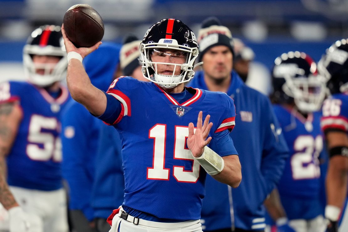 New York Giants quarterback Tommy DeVito (15) warms up before playing against the Green Bay Packers in an NFL football game, Monday, Dec. 11, 2023, in East Rutherford, N.J.