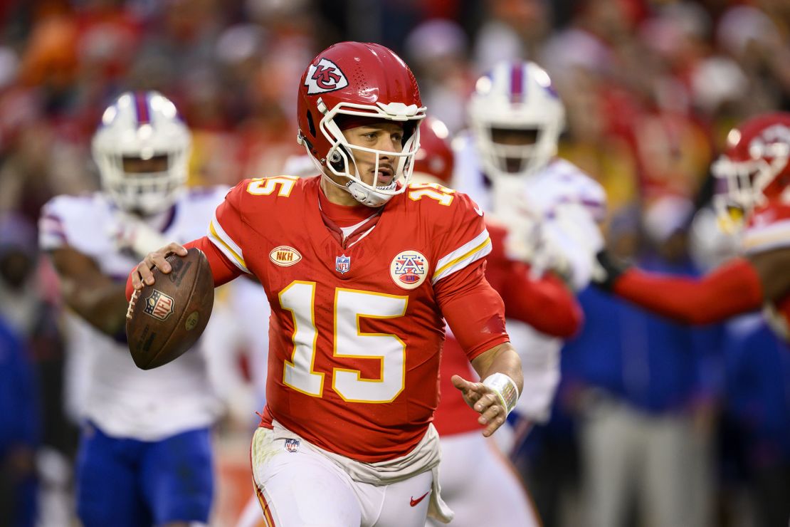 Kansas City Chiefs quarterback Patrick Mahomes looks to pass against the Buffalo Bills during the first half of an NFL football game, Sunday, Dec. 10, 2023 in Kansas City, Mo. (AP Photo/Reed Hoffmann)