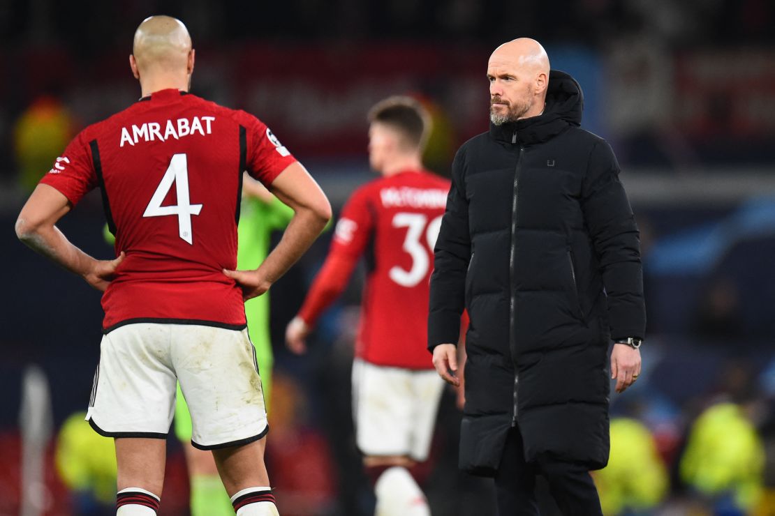 Manchester United's Dutch manager Erik ten Hag reacts after the UEFA Champions League group A football match between Manchester United and FC Bayern Munich at Old Trafford stadium in Manchester, north west England, on December 12, 2023. (Photo by PETER POWELL / AFP) (Photo by PETER POWELL/AFP via Getty Images)