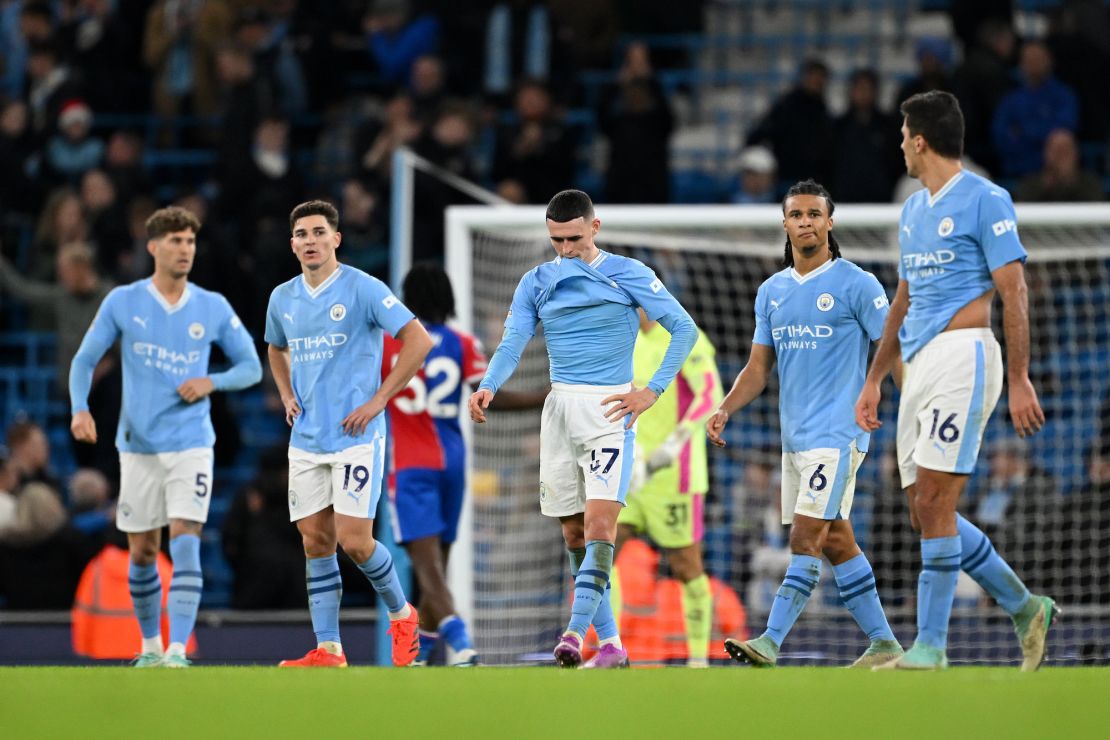 MANCHESTER, ENGLAND - DECEMBER 16: Phil Foden and teammates of Manchester City look dejected following the Premier League match between Manchester City and Crystal Palace at Etihad Stadium on December 16, 2023 in Manchester, England. (Photo by Shaun Botterill/Getty Images)