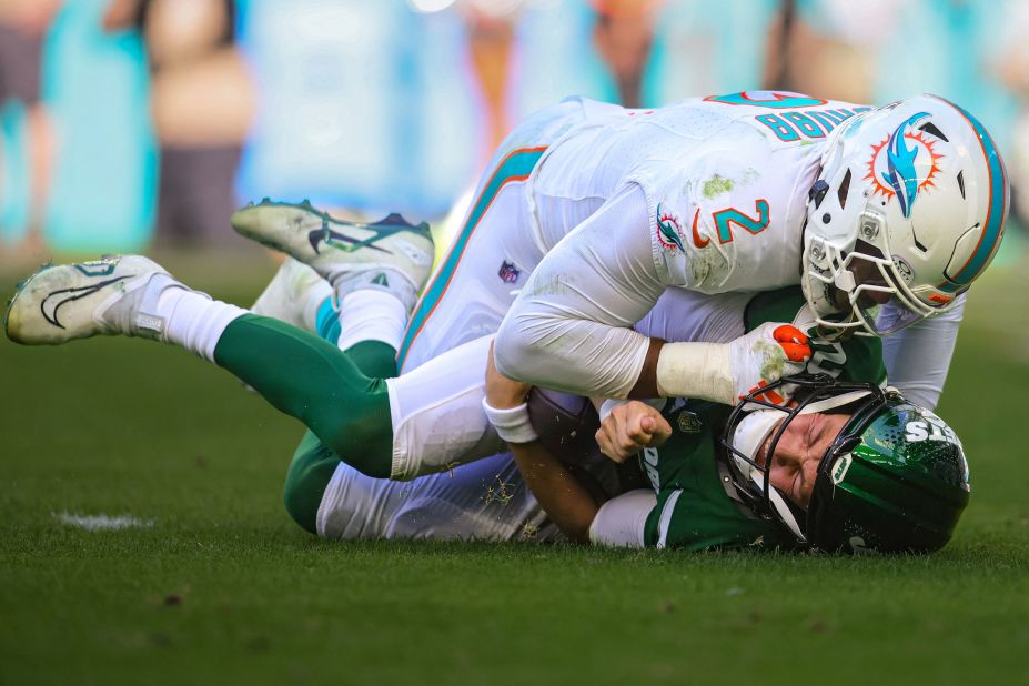 Miami Dolphins linebacker Bradley Chubb sacks New York Jets quarterback Zach Wilson.