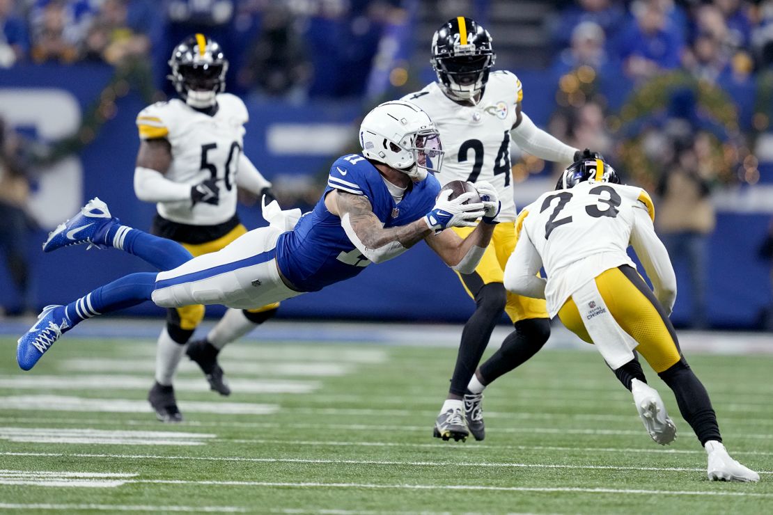 Indianapolis Colts wide receiver Michael Pittman Jr. (11) catches a pass before being hit by Pittsburgh Steelers safety Damontae Kazee (23) during the first half of an NFL football game in Indianapolis Saturday, Dec. 16, 2023. Pittman was injured on the play and Kazee was ejected from the game. (AP Photo/Michael Conroy)