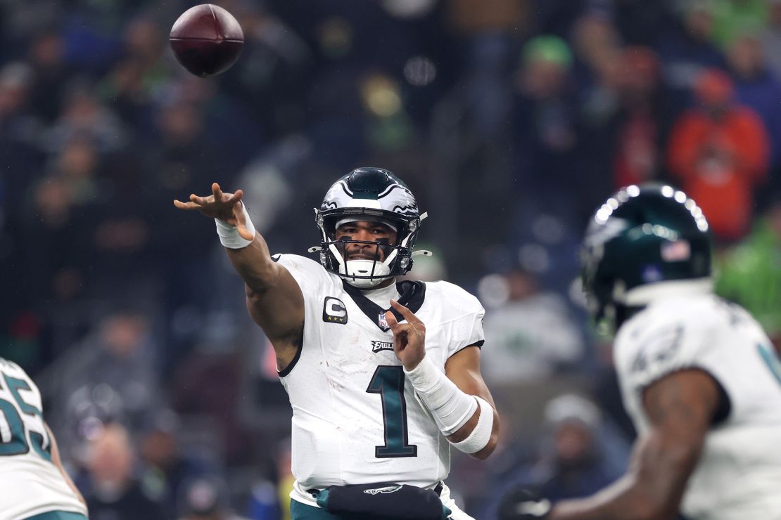 SEATTLE, WASHINGTON - DECEMBER 18: Jalen Hurts #1 of the Philadelphia Eagles throws the ball in the first quarter against the Seattle Seahawks at Lumen Field on December 18, 2023 in Seattle, Washington. (Photo by Steph Chambers/Getty Images)