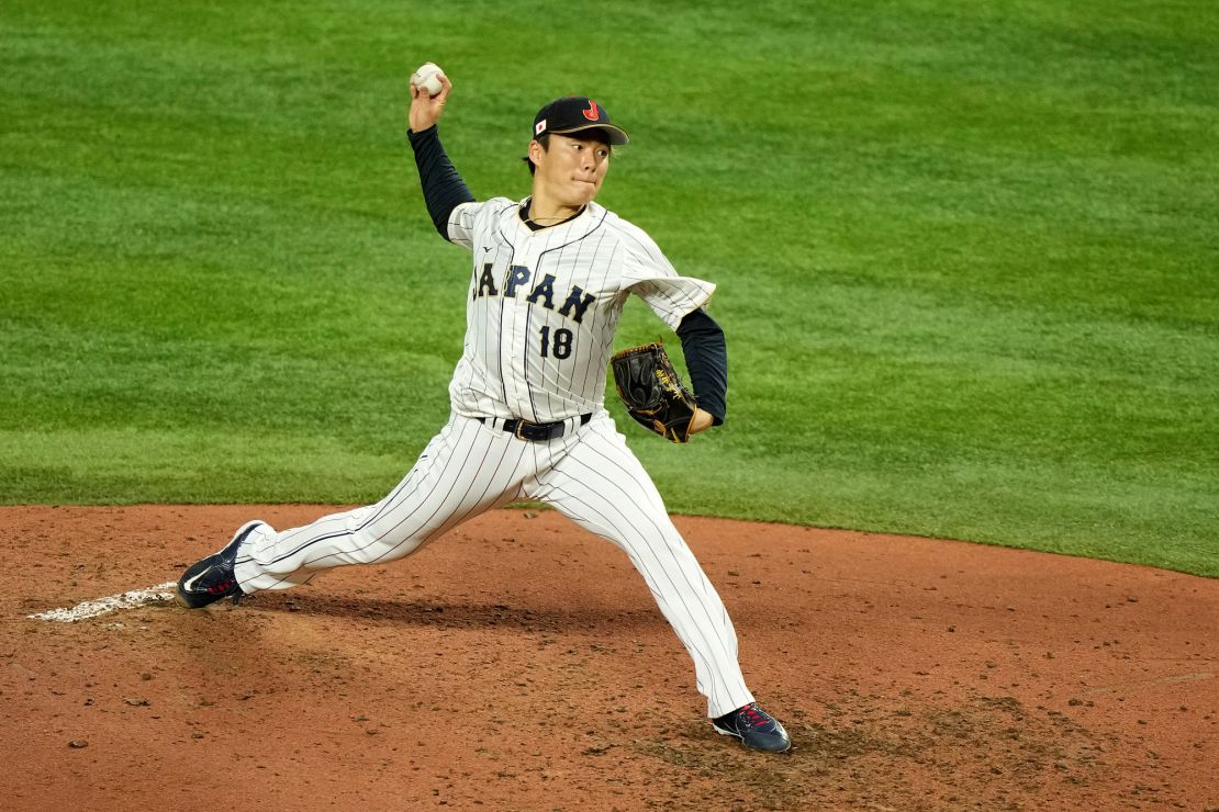 MIAMI, FLORIDA - MARCH 20: Yoshinobu Yamamoto #18 of Team Japan delivers a pitch against Team Mexico during the fifth inning during the World Baseball Classic Semifinals at loanDepot park on March 20, 2023 in Miami, Florida. (Photo by Eric Espada/Getty Images)