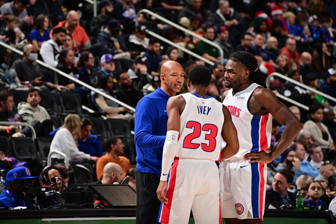 Head Coach Monty Williams of the Detroit Pistons talks with Jaden Ivey #23 and Isaiah Stewart #28 during the game against the Utah Jazz on December 21, 2023 at Little Caesars Arena in Detroit, Michigan.