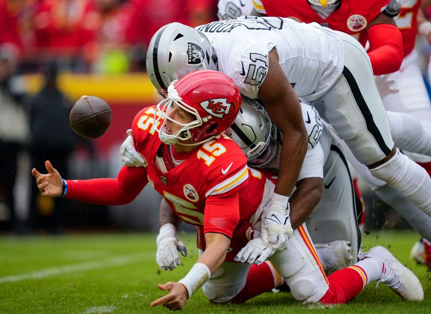 Kansas City Chiefs quarterback Patrick Mahomes recovers his fumble as he is hit during the <a href="https://www.cnn.com/2023/12/27/sport/kansas-city-chiefs-las-vegas-raiders-spt-intl/index.html" target="_blank">Chiefs' disappointing 20-14 loss</a> to the Las Vegas Raiders. The loss ensured the Chiefs cannot earn the No.1 seed in the AFC and postponed the sealing of their eighth consecutive AFC West title, as they fell to 9-6.