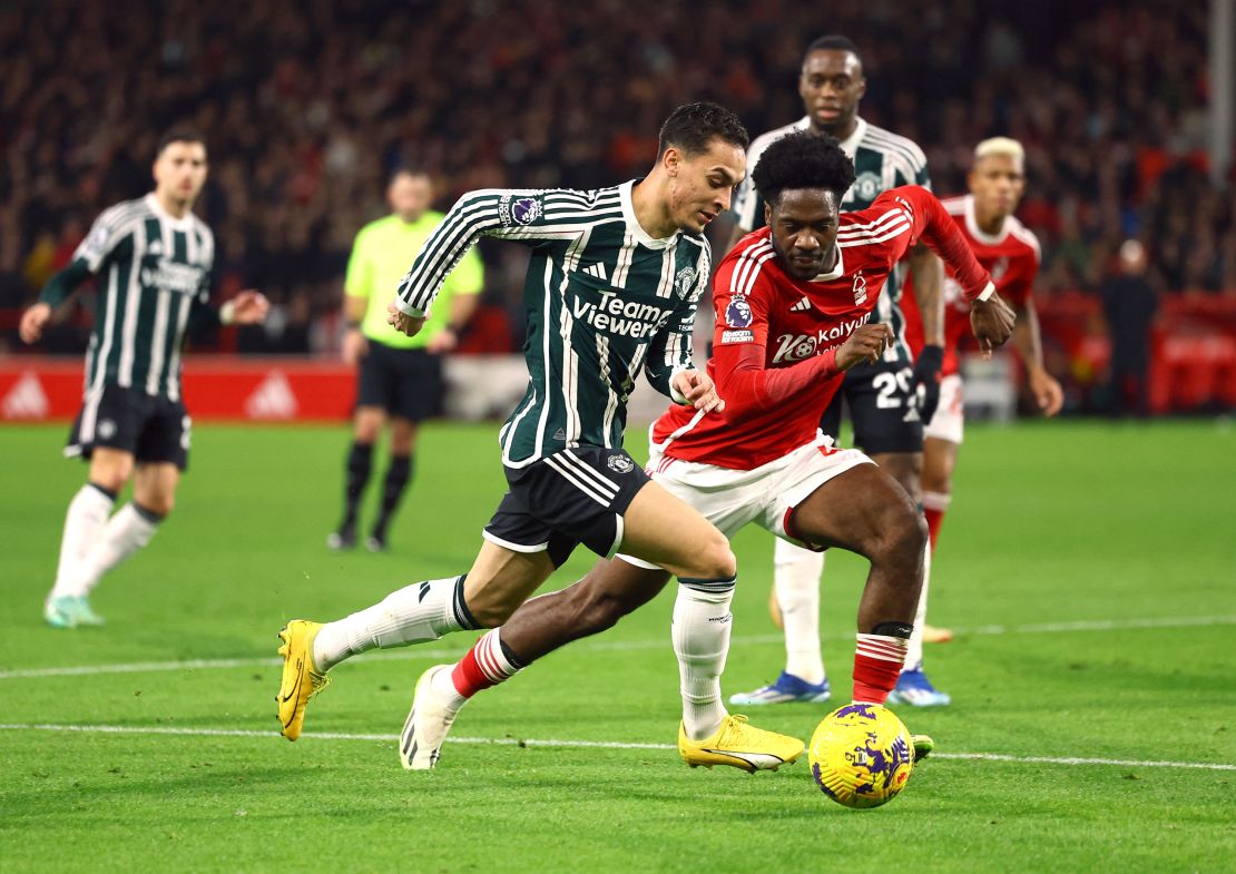 Soccer Football - Premier League - Nottingham Forest v Manchester United - The City Ground, Nottingham, Britain - December 30, 2023 
Nottingham Forest's Ola Aina in action with Manchester United's Antony