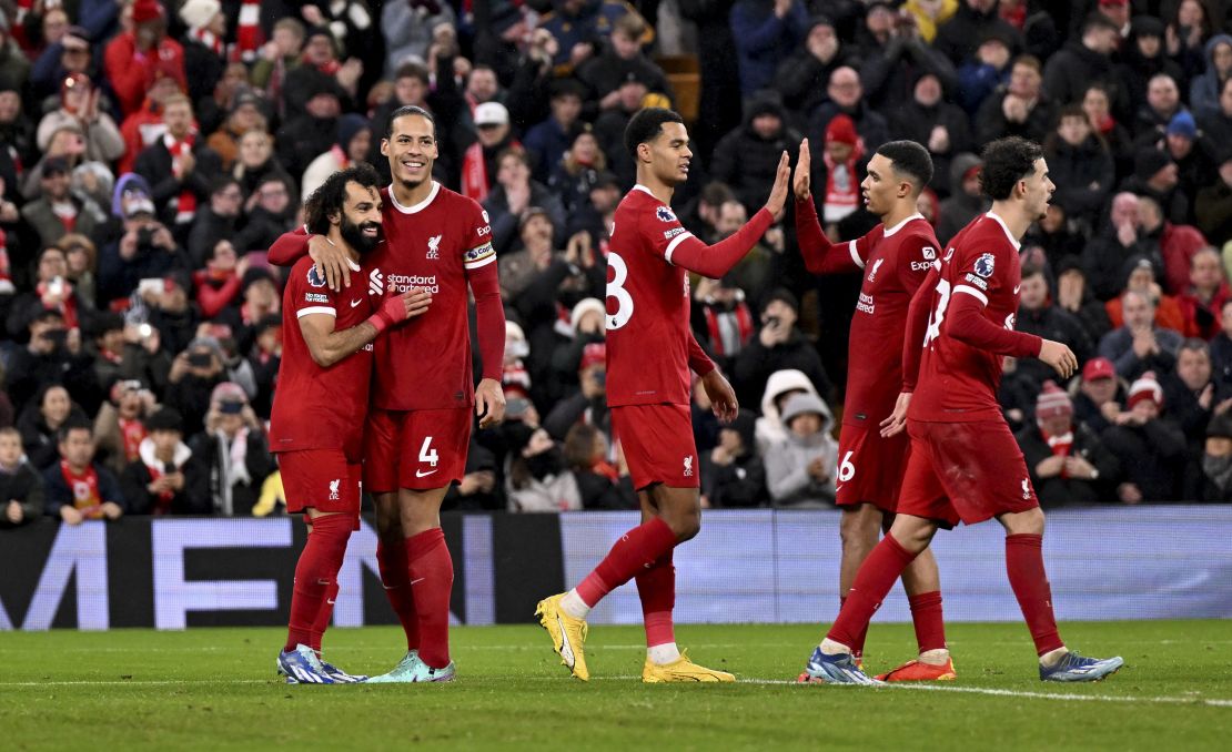 LIVERPOOL, ENGLAND - JANUARY 01: (THE SUN OUT, THE SUN ON SUNDAY OUT) Mohamed Salah of Liverpool celebrating after scoring the fourth goal making the score 4-2 during the Premier League match between Liverpool FC and Newcastle United at Anfield on January 01, 2024 in Liverpool, England. (Photo by Andrew Powell/Liverpool FC via Getty Images)