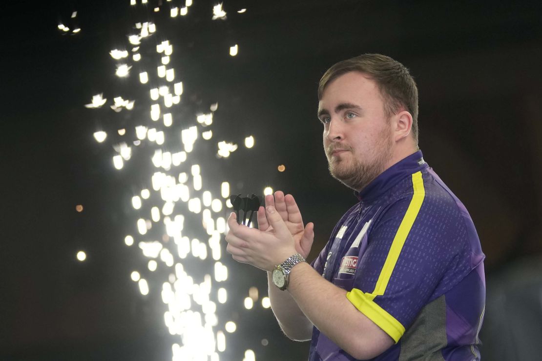 Luke Littler of England arrives for the quarterfinal match against Brendan Dolan of Northern Ireland at the World Darts Championship, in London, Monday, Jan. 1, 2024. (AP Photo/Kin Cheung)