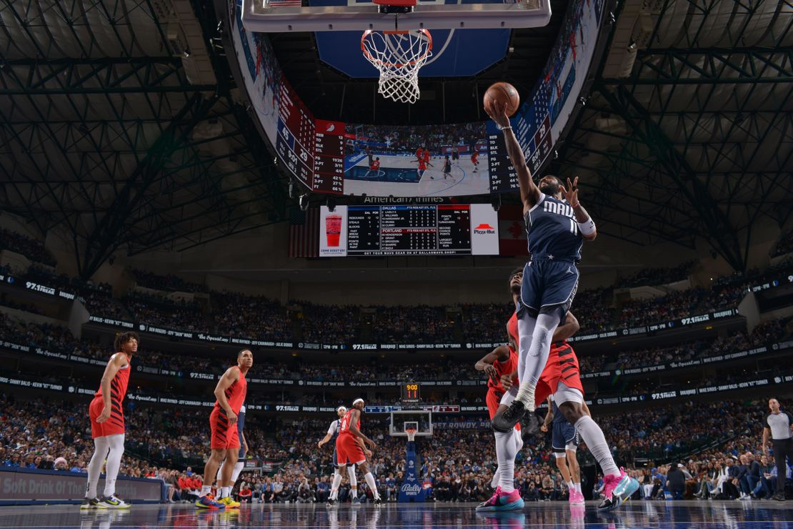 DALLAS, TX - JANUARY 3: Kyrie Irving #11 of the Dallas Mavericks drives to the basket during the game against the Portland Trail Blazers on January 3, 2024 at the American Airlines Center in Dallas, Texas. NOTE TO USER: User expressly acknowledges and agrees that, by downloading and or using this photograph, User is consenting to the terms and conditions of the Getty Images License Agreement. Mandatory Copyright Notice: Copyright 2024 NBAE (Photo by Glenn James/NBAE via Getty Images)