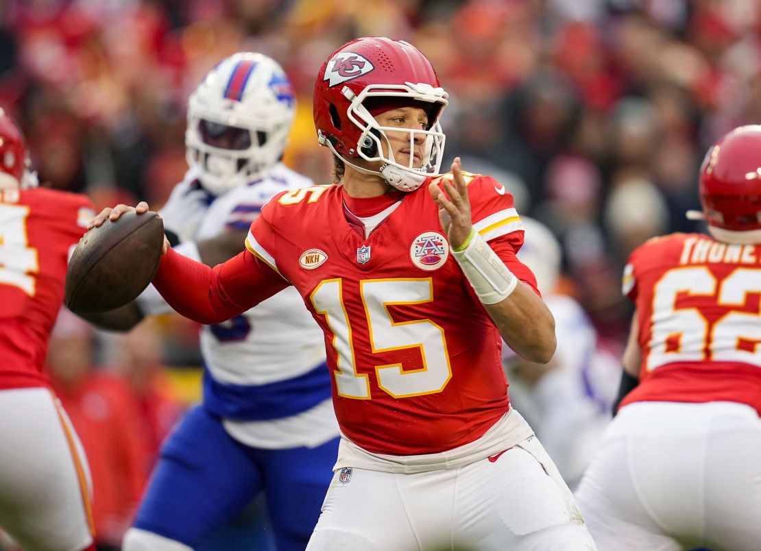 Dec 10, 2023; Kansas City, Missouri, USA; Kansas City Chiefs quarterback Patrick Mahomes (15) throws a pass against the Buffalo Bills during the first half at GEHA Field at Arrowhead Stadium. Mandatory Credit: Jay Biggerstaff-USA TODAY Sports