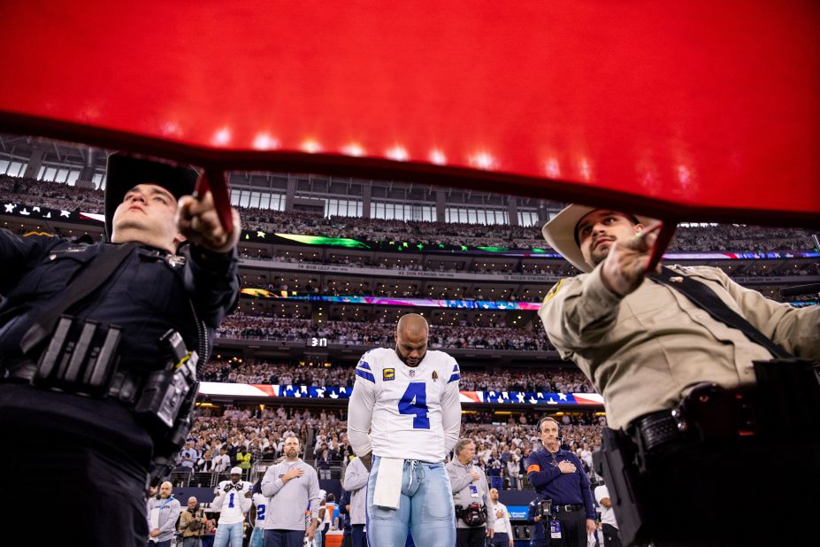 Dallas Cowboys quarterback Dak Prescott takes a moment during the national anthem before the game on January 14.