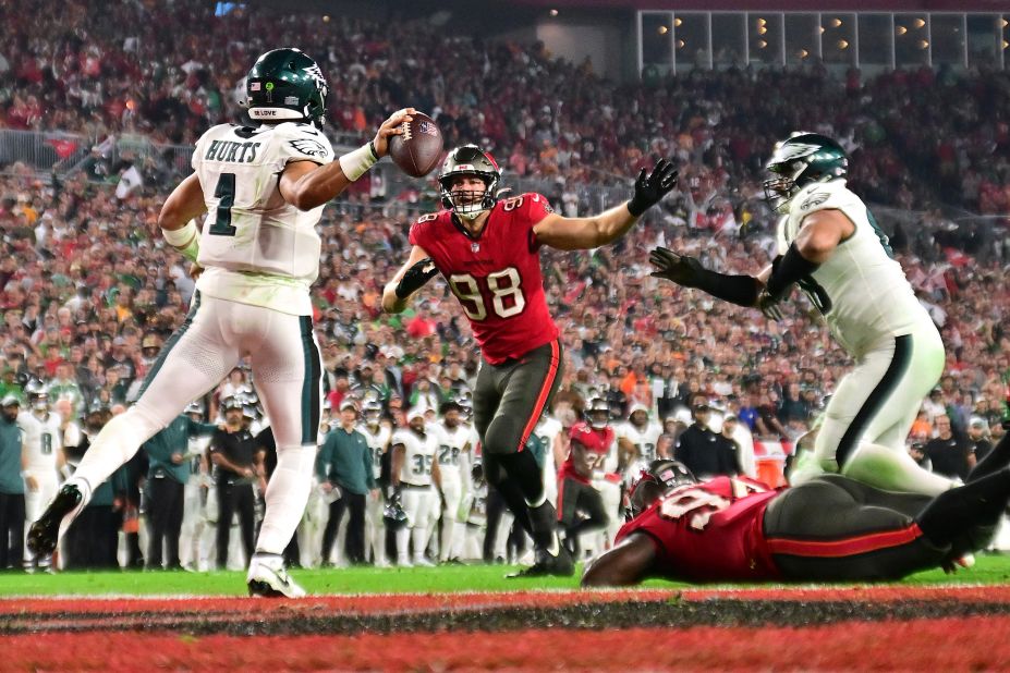 Philadelphia Eagles quarterback Jalen Hurts runs in his own end zone, looking for someone to throw to, during a playoff game against the Tampa Bay Buccaneers on Monday, January 15. He was later called for intentional grounding on the play, resulting in a safety. The Eagles, last year's NFC champion, lost 32-9.