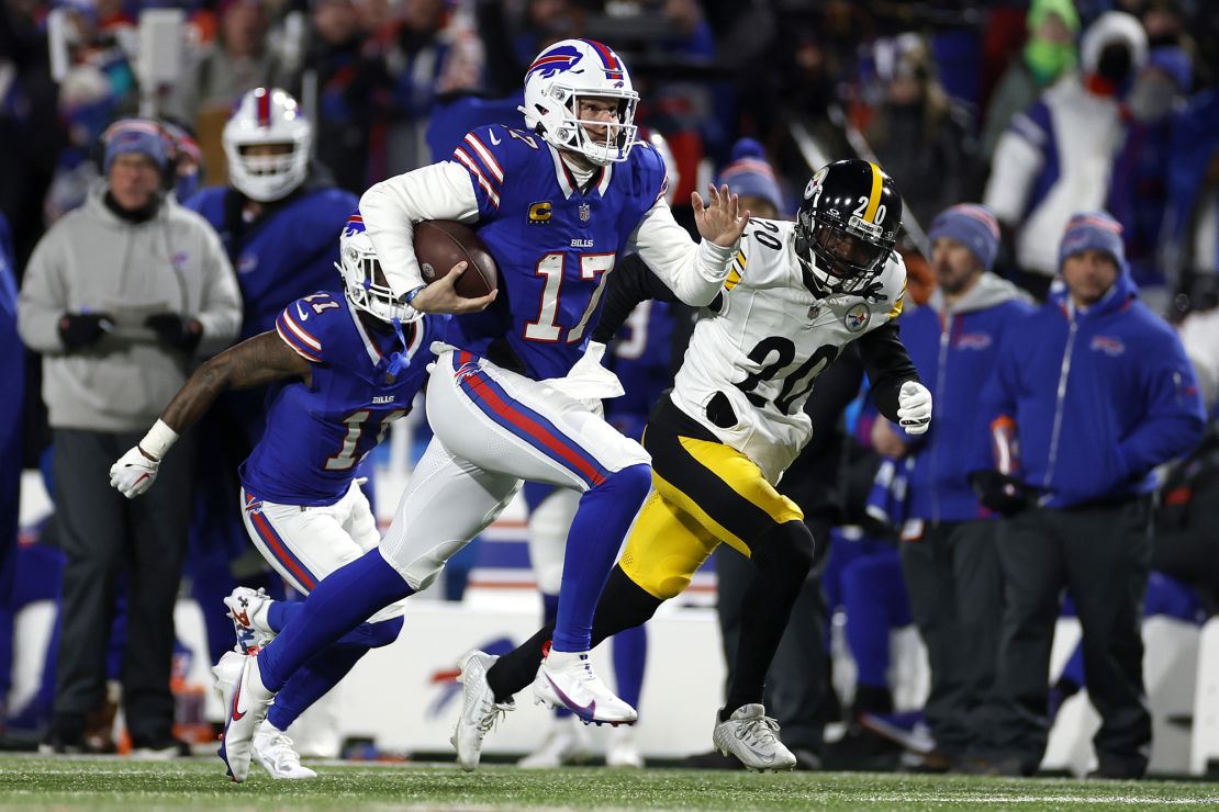 ORCHARD PARK, NEW YORK - JANUARY 15: Josh Allen #17 of the Buffalo Bills scores a 52-yard touchdown against the Pittsburgh Steelers during the second quarter at Highmark Stadium on January 15, 2024 in Orchard Park, New York. (Photo by Sarah Stier/Getty Images)