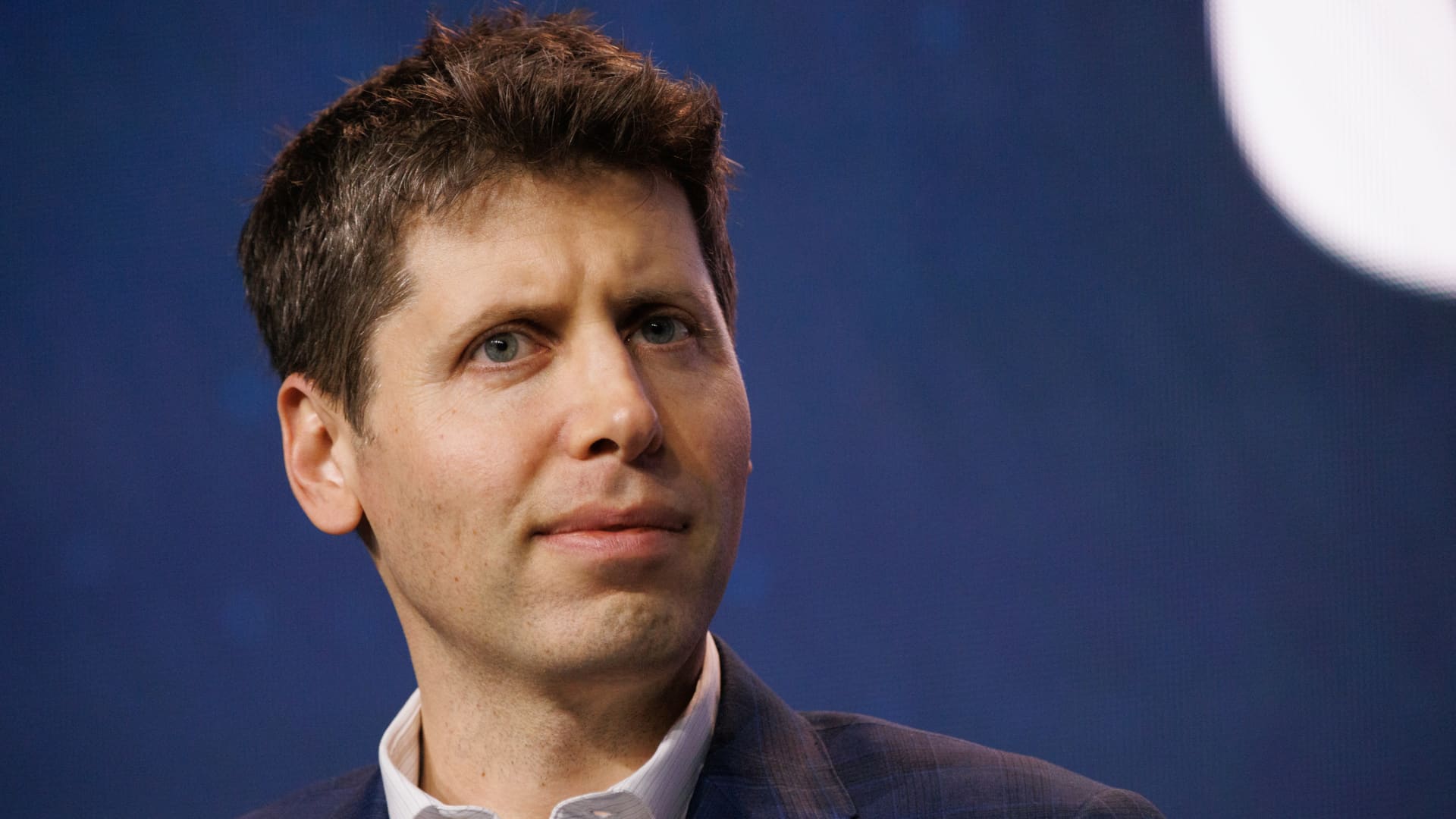 OpenAI’s Sam Altman says human-level AI is coming but will change world much less than we think