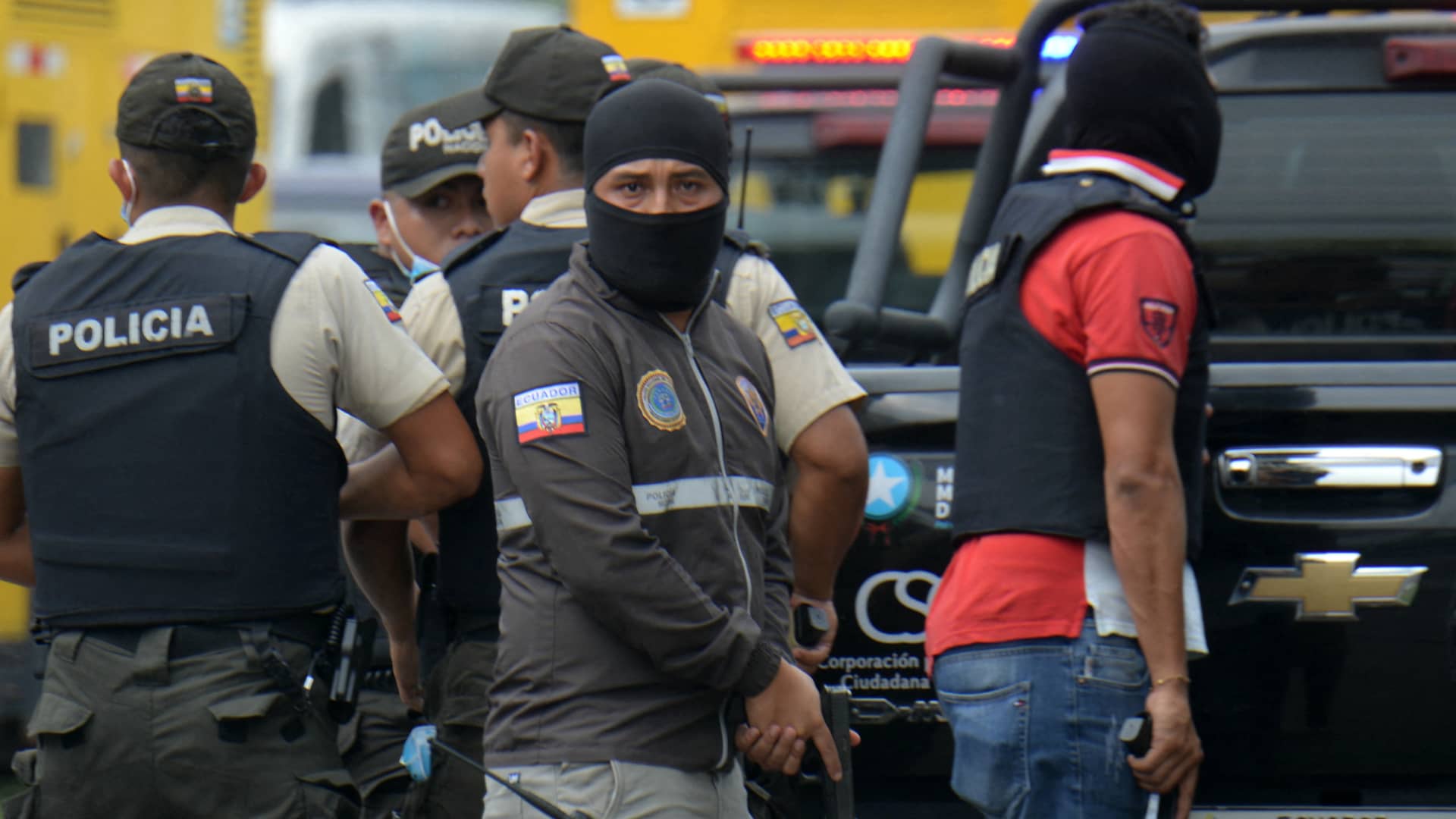 Ecuador TV studio taken over live on air by masked people brandishing guns