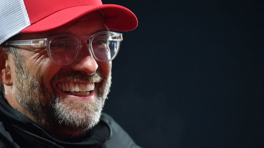 Liverpool's German manager Jurgen Klopp speaks during a television interview after the English Premier League football match between Liverpool and Arsenal at Anfield in Liverpool, north west England on September 28, 2020. (Photo by Paul ELLIS / POOL / AFP) / RESTRICTED TO EDITORIAL USE. No use with unauthorized audio, video, data, fixture lists, club/league logos or 'live' services. Online in-match use limited to 120 images. An additional 40 images may be used in extra time. No video emulation. Social media in-match use limited to 120 images. An additional 40 images may be used in extra time. No use in betting publications, games or single club/league/player publications. /  (Photo by PAUL ELLIS/POOL/AFP via Getty Images)