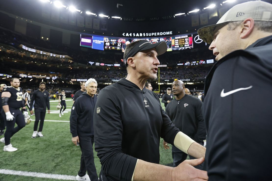 New Orleans Saints head coach Dennis Allen, front center, speaks with Atlanta Falcons head coach Arthur Smith, right, after an NFL football game, Sunday, Jan. 7, 2024, in New Orleans. (AP Photo/Tyler Kaufman)