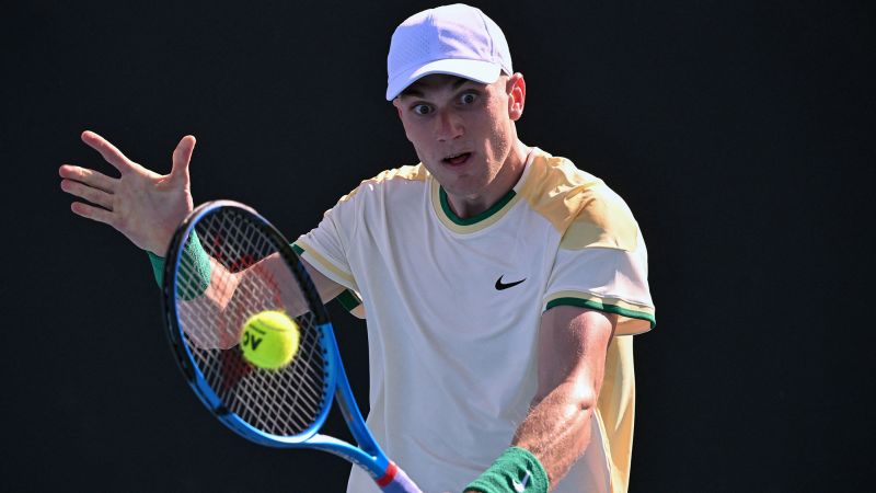 Jack Draper vomits in courtside bin after five-set victory at the Australian Open