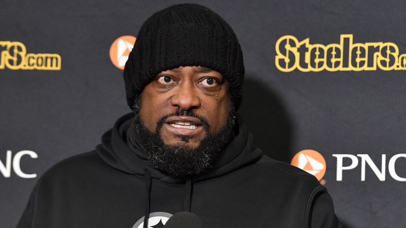 Steelers head coach Mike Tomlin walks out of postgame news conference after contract question following playoff loss