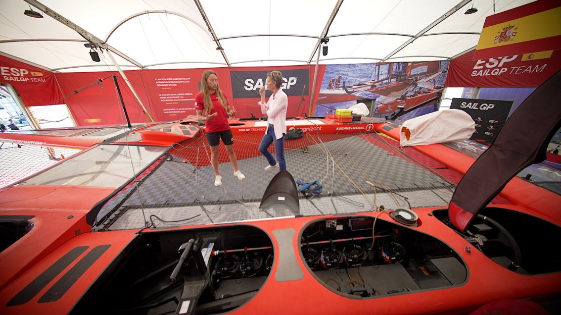 Spain SailGP strategist Nicole van der Velden shows CNN's Becky Anderson the F50 catamaran.