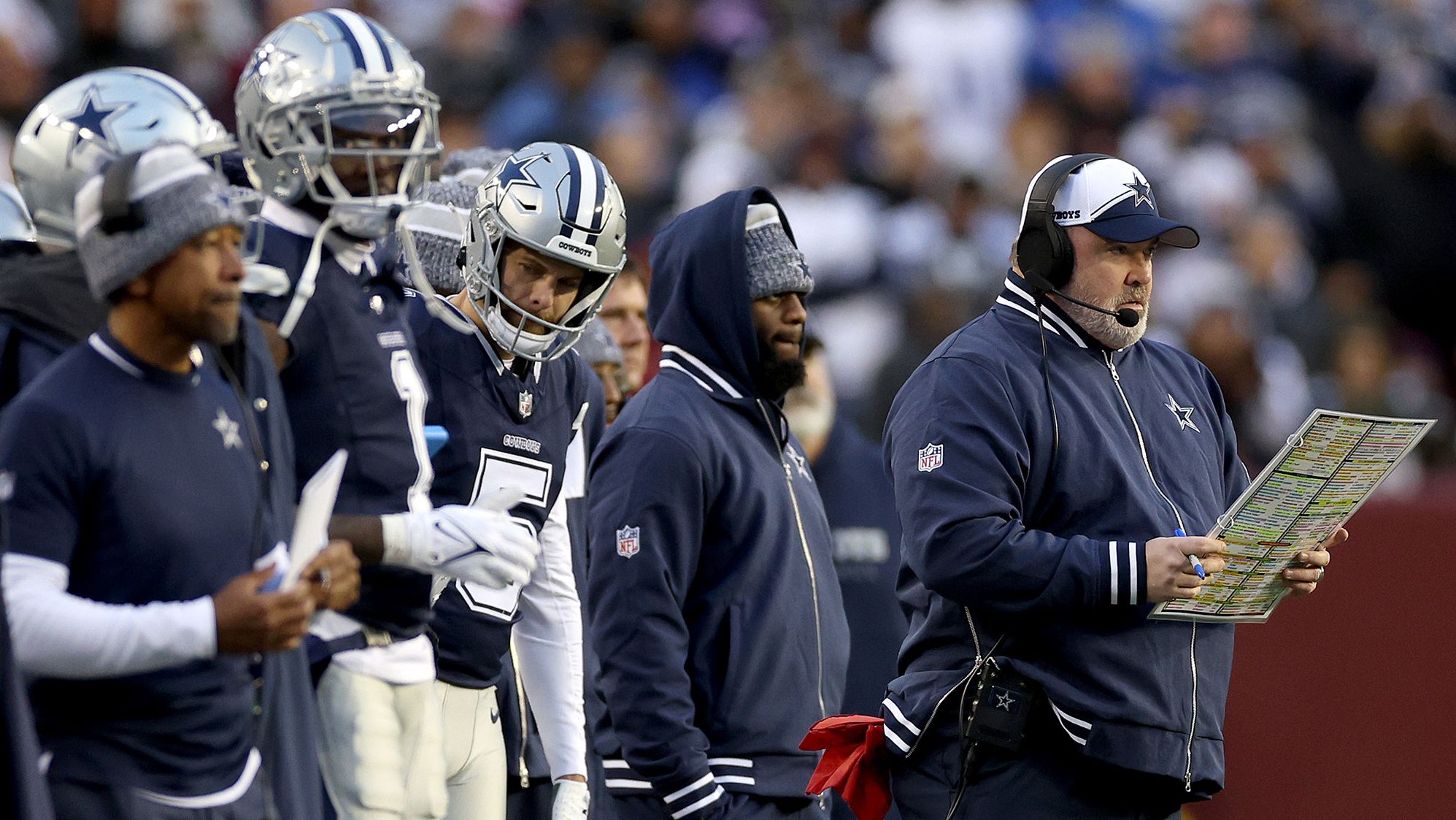 LANDOVER, MARYLAND - JANUARY 07: Dallas Cowboys head coach Mike McCarthy looks on during the first quarter against the Washington Commanders at FedExField on January 07, 2024 in Landover, Maryland. (Photo by Patrick Smith/Getty Images)