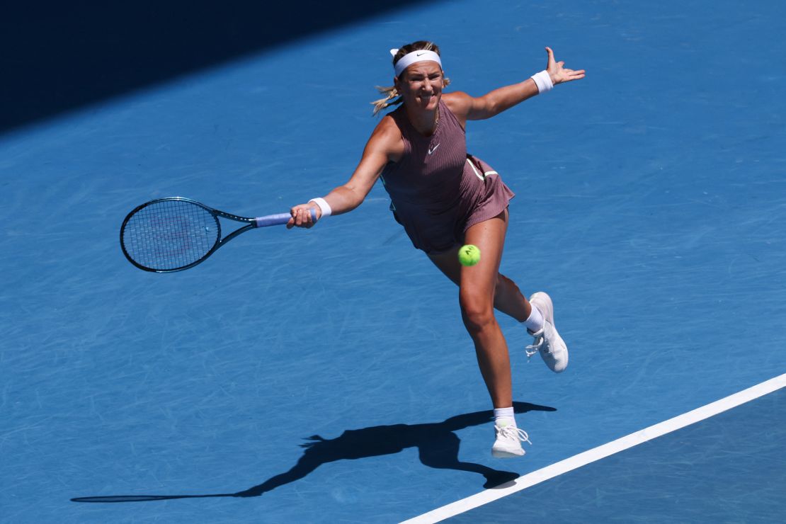 Belarus' Victoria Azarenka hits a return against Ukraine's Dayana Yastremska during their women's singles match on day nine of the Australian Open tennis tournament in Melbourne on January 22, 2024. (Photo by David GRAY / AFP) / -- IMAGE RESTRICTED TO EDITORIAL USE - STRICTLY NO COMMERCIAL USE -- (Photo by DAVID GRAY/AFP via Getty Images)