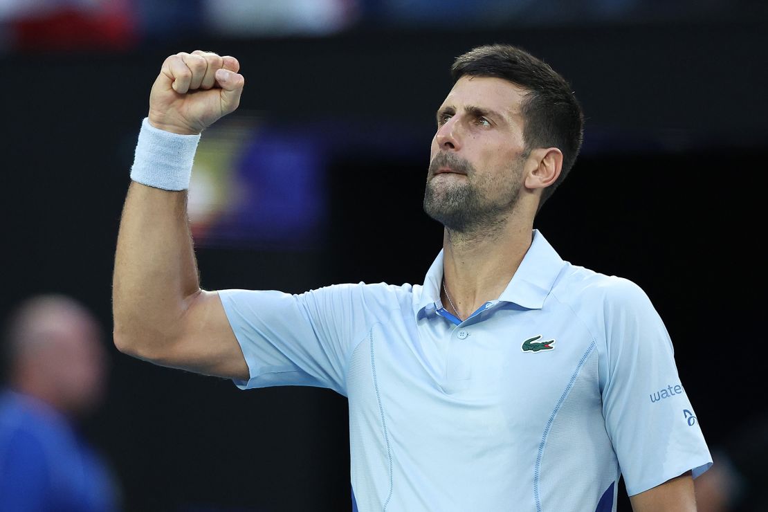 MELBOURNE, AUSTRALIA - JANUARY 23: Novak Djokovic of Serbia celebrates winning match point during their quarterfinals singles match against Taylor Fritz of the United States during the 2024 Australian Open at Melbourne Park on January 23, 2024 in Melbourne, Australia. (Photo by Daniel Pockett/Getty Images)