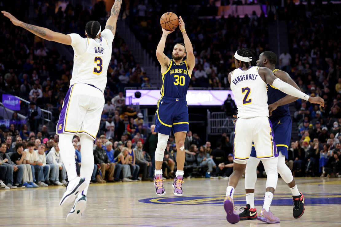 SAN FRANCISCO, CALIFORNIA - JANUARY 27: Stephen Curry #30 of the Golden State Warriors shoots over Anthony Davis #3 of the Los Angeles Lakers at Chase Center on January 27, 2024 in San Francisco, California. NOTE TO USER: User expressly acknowledges and agrees that, by downloading and or using this photograph, User is consenting to the terms and conditions of the Getty Images License Agreement.  (Photo by Ezra Shaw/Getty Images)