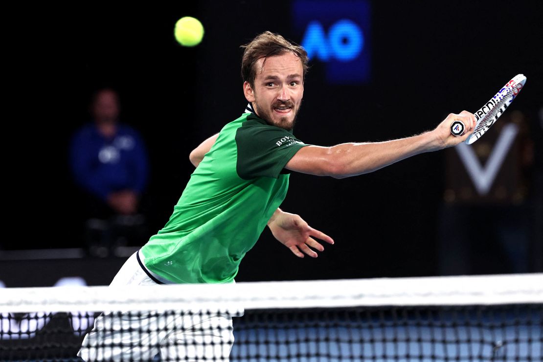 Russia's Daniil Medvedev hits a return against Italy's Jannik Sinner during their men's singles final match on day 15 of the Australian Open tennis tournament in Melbourne on January 28, 2024. (Photo by David GRAY / AFP) / -- IMAGE RESTRICTED TO EDITORIAL USE - STRICTLY NO COMMERCIAL USE -- (Photo by DAVID GRAY/AFP via Getty Images)