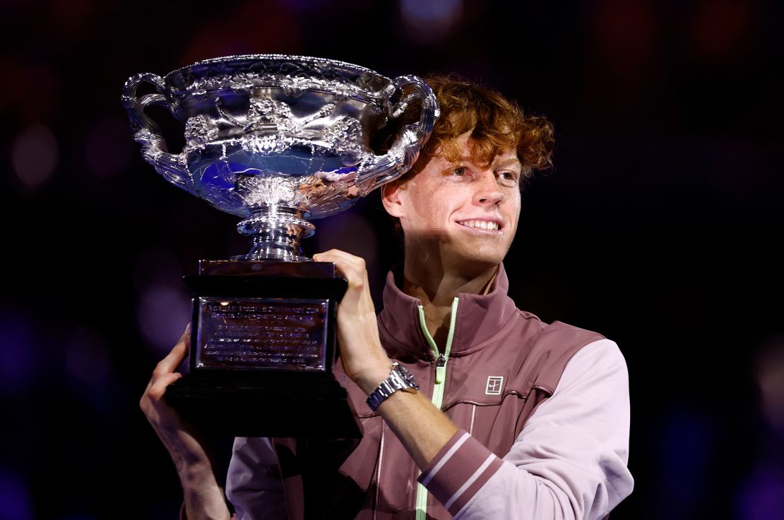 Tennis - Australian Open - Melbourne Park, Melbourne, Australia - January 28, 2024
Italy's Jannik Sinner celebrates with the trophy after winning the final against Russia's Daniil Medvedev