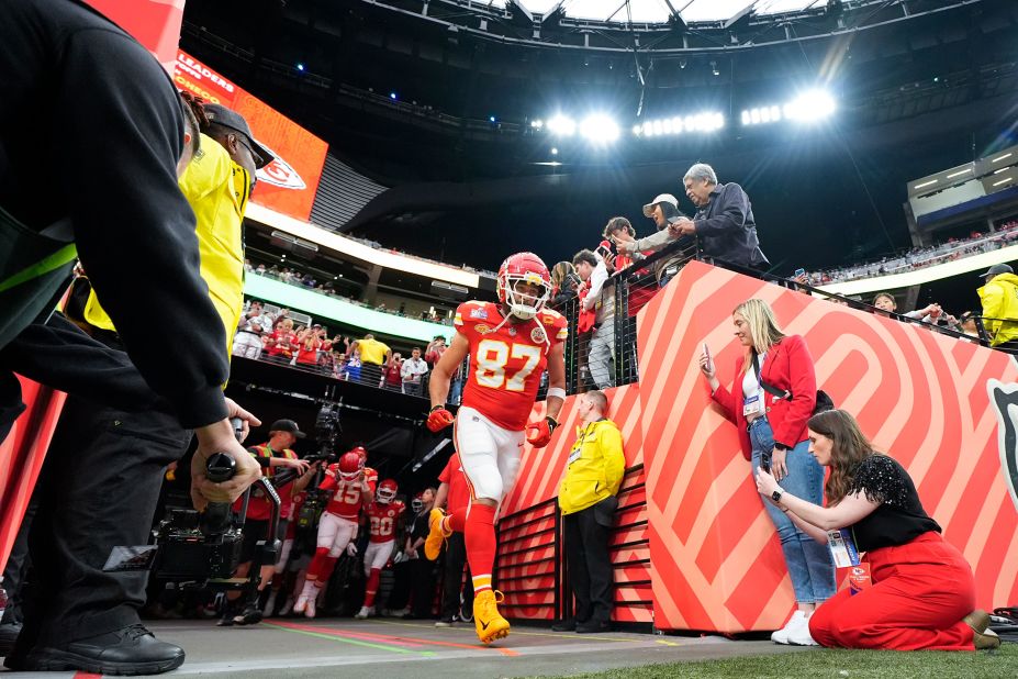 Kelce takes the field before the start of the game.