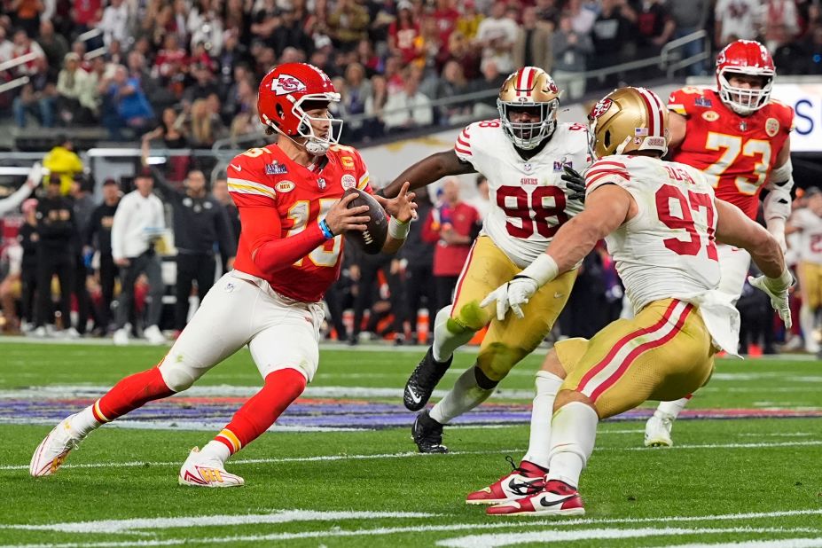 Mahomes scrambles during the second half.