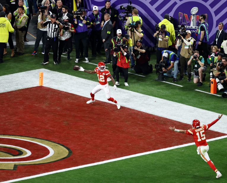 Mahomes, bottom right, runs toward Hardman after the last play.