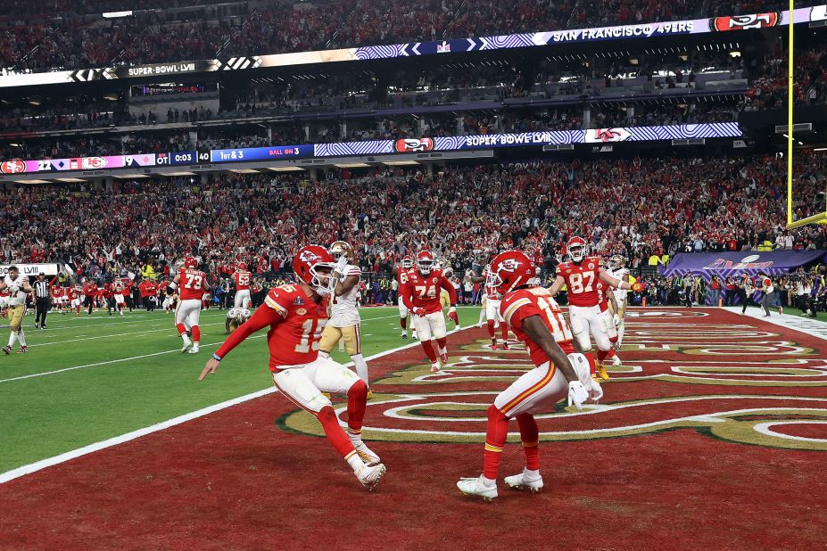 Hardman, front right, celebrates with Mahomes after they connected for the last touchdown.