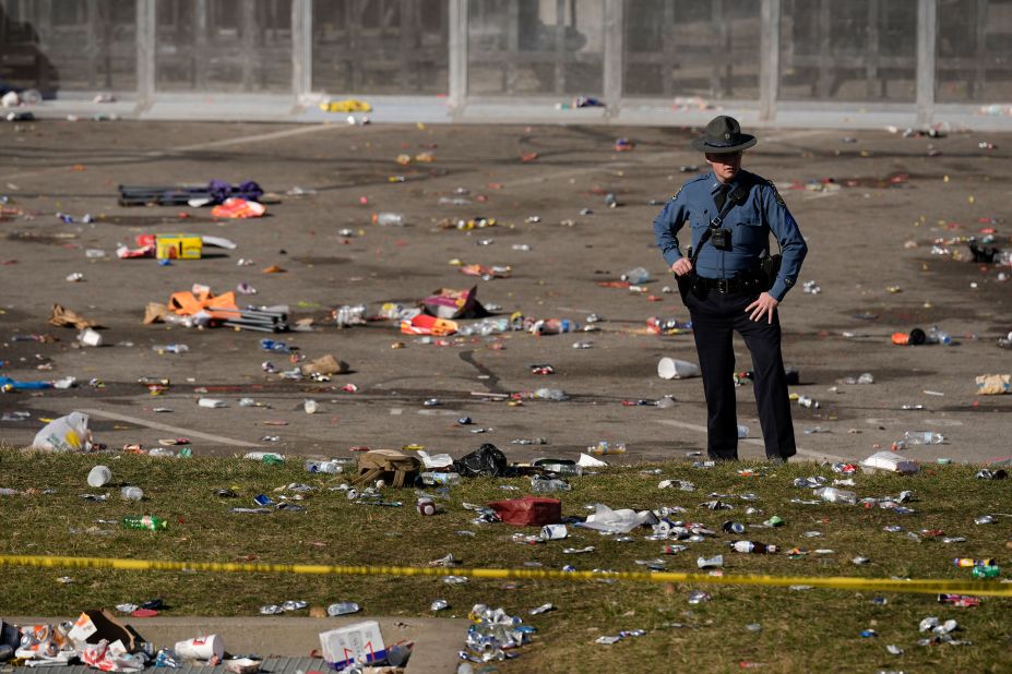 A law enforcement officer looks around the area outside Union Station after the shooting.