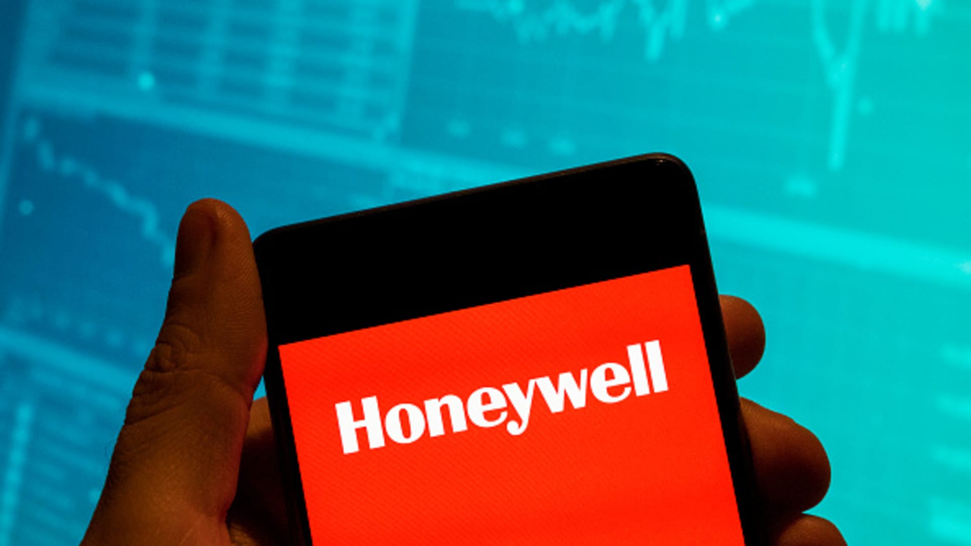 Stocks making the biggest moves midday: Peloton, Honeywell, Norfolk Southern, Boot Barn and more