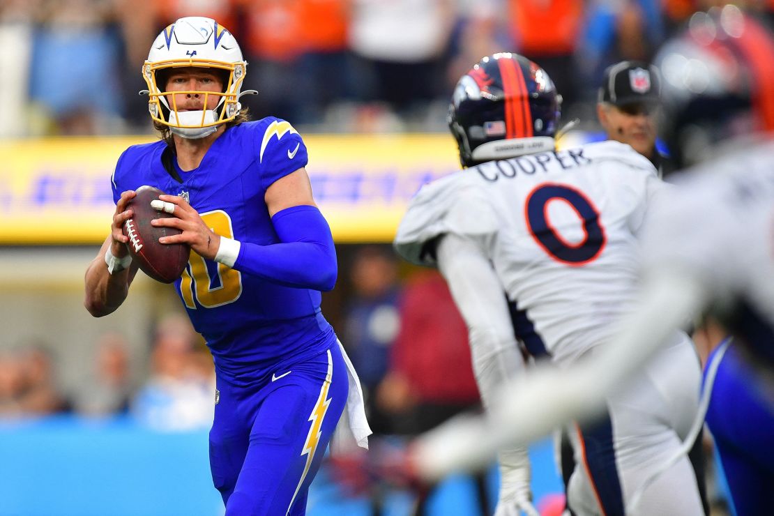 Justin Herbert looks to pass against the Denver Broncos.