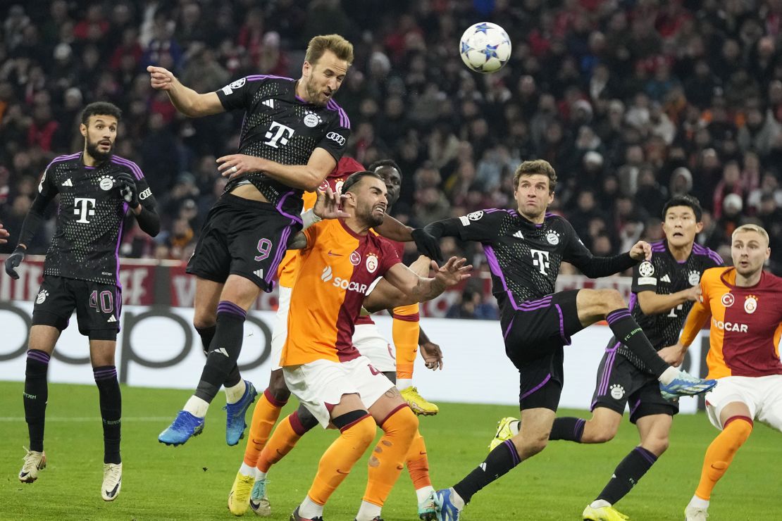 Bayern Munich's Harry Kane heads goalwards against Galatasaray.