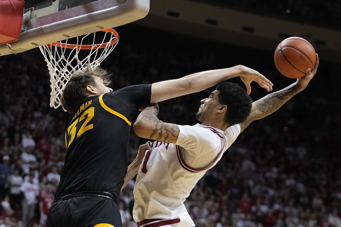 Indiana's Kel'el Ware dunks on Iowa's Owen Freeman in an NCAA basketball game on January 30 in Bloomington, Indiana.