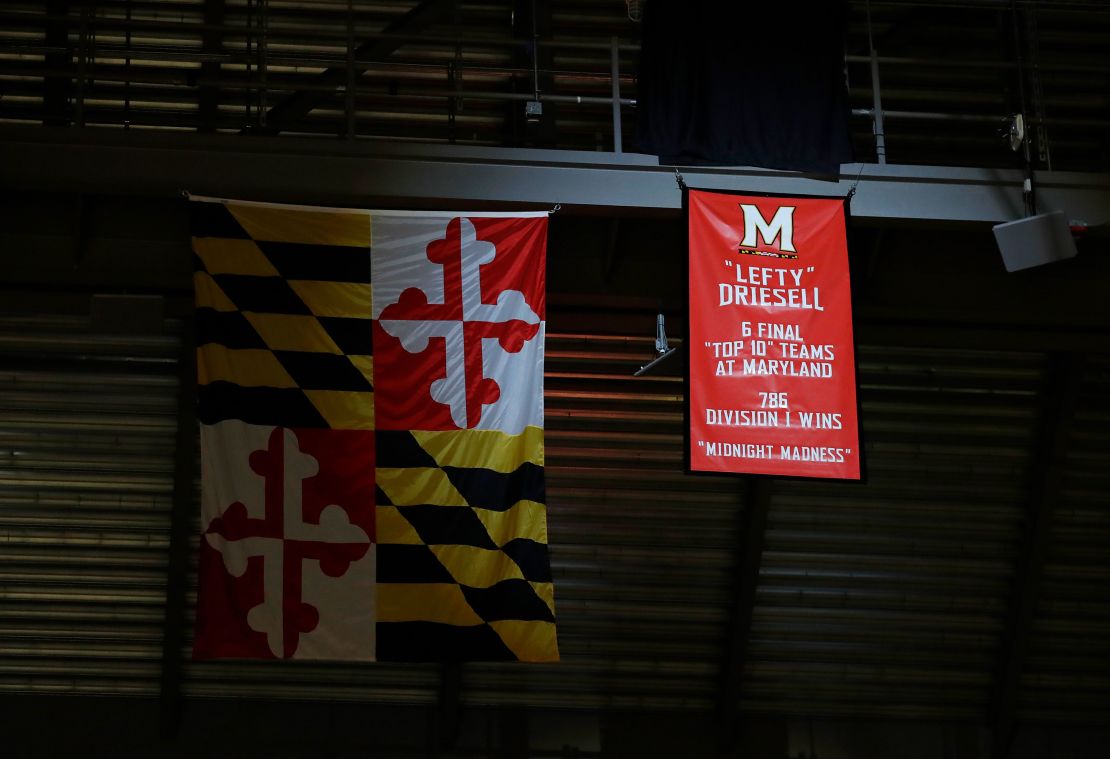 A banner honoring former Maryland men's basketball coach "Lefty" Driesell hangs from the rafters after being unveiled before an NCAA college basketball game between Maryland and Ohio State in 2017.