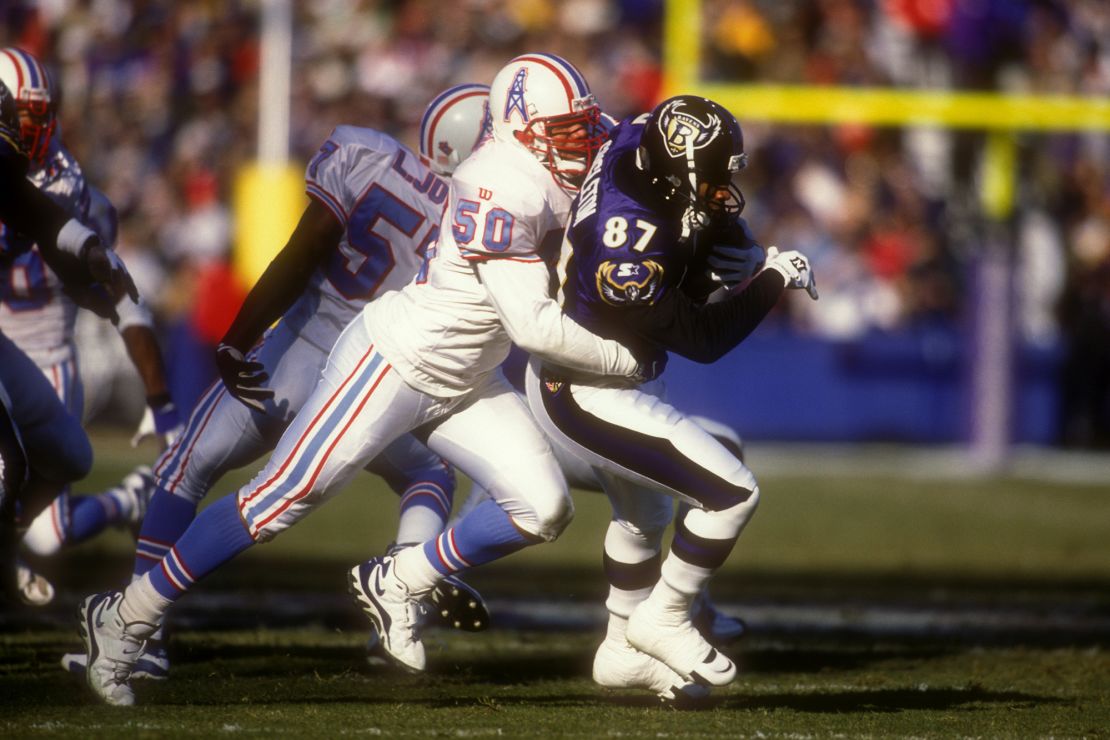 Killens tackles Nate Singleton of the Baltimore Ravens during a football game on December 12, 1997.