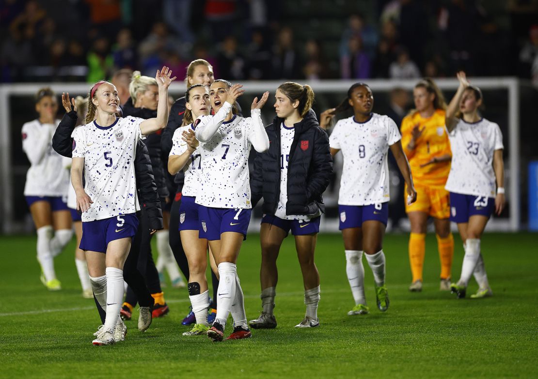 US players celebrate after their 5-0 win.