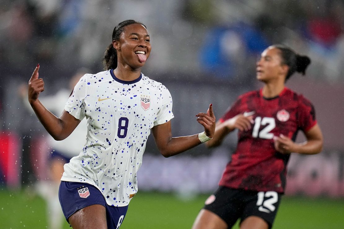 Shaw celebrates after scoring a goal against Canada.