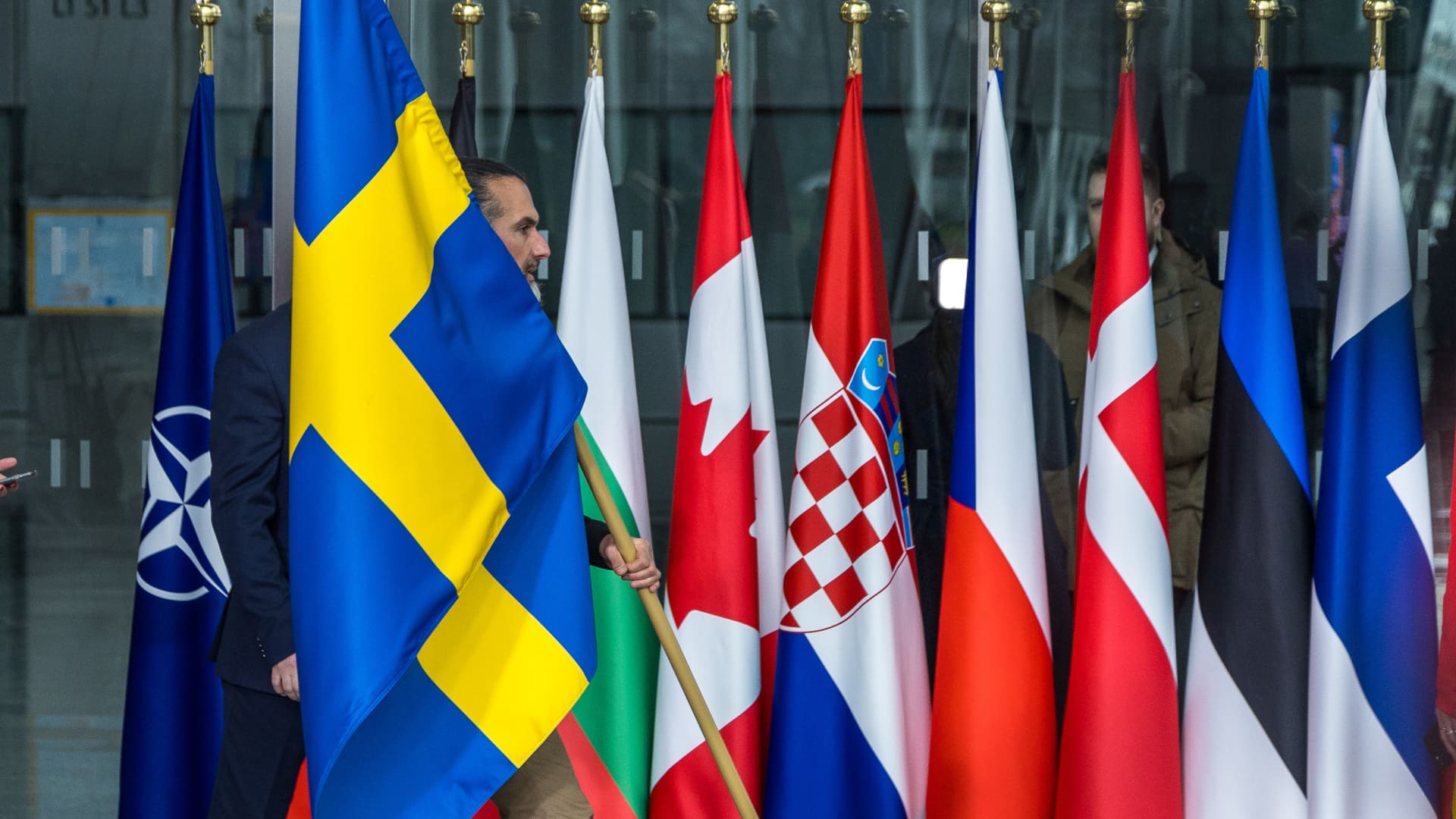 Swedish flag is raised over NATO headquarters for the first time; Pope Francis’ ‘white flag’ call for Ukraine faces backlash