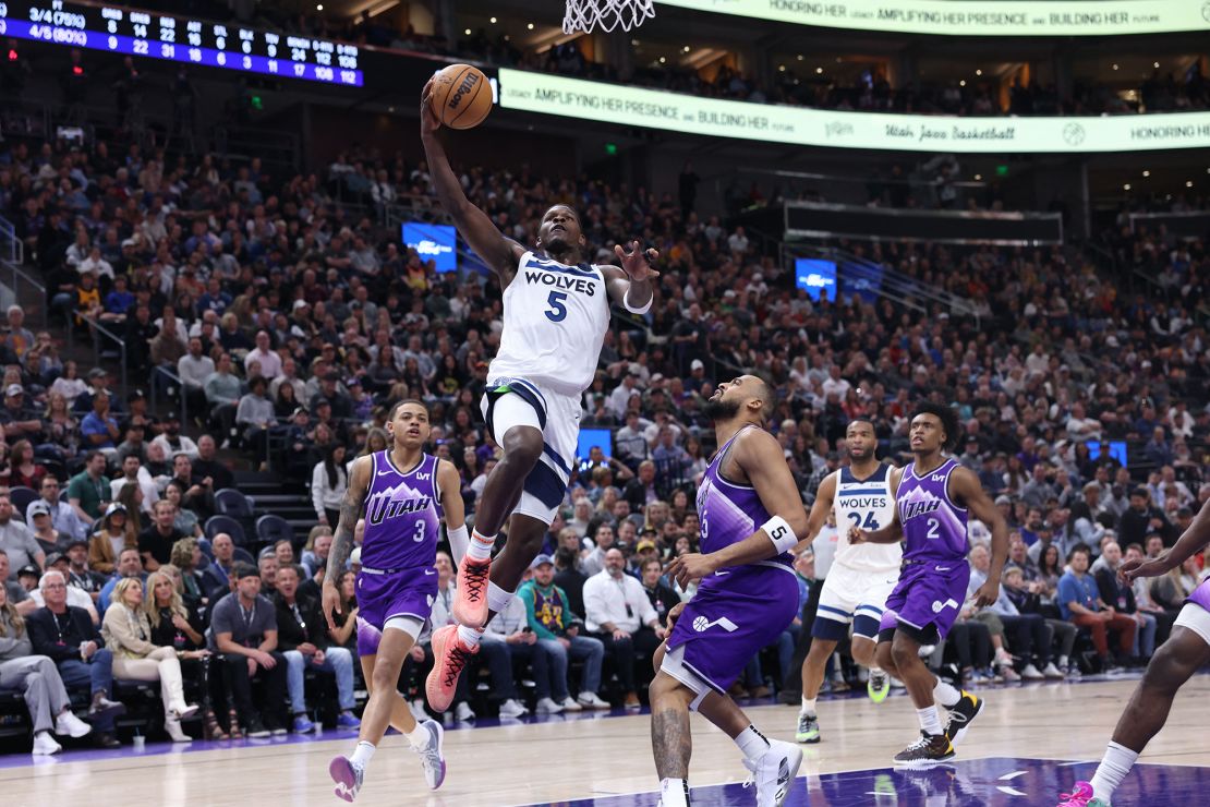 Edwards drives to the hoop during the game.